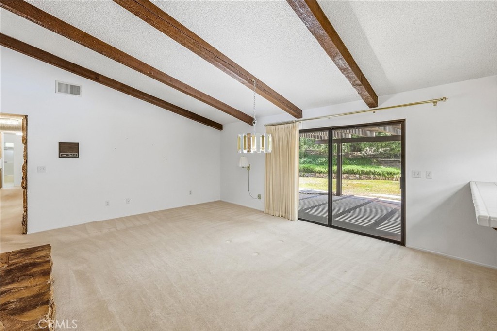 37295 Oak View Road Yucaipa, CA 92399 - Photo 21 of 59 a view of an empty room with windows