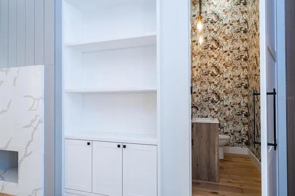 a bathroom with a glass door