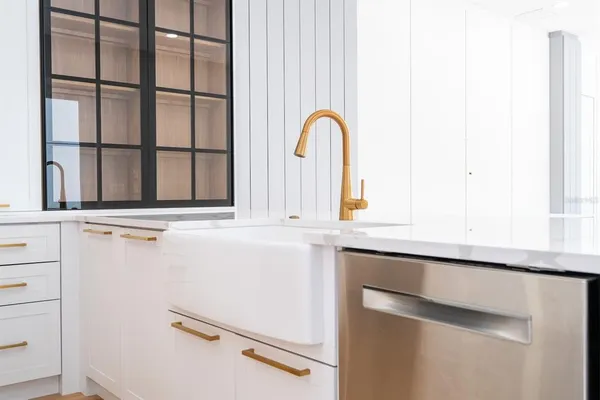 a white tub sitting in a bathroom