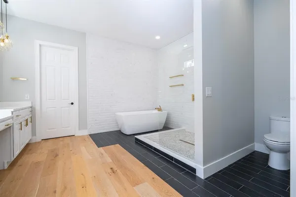 a view of storage and utility room with racks on the wall