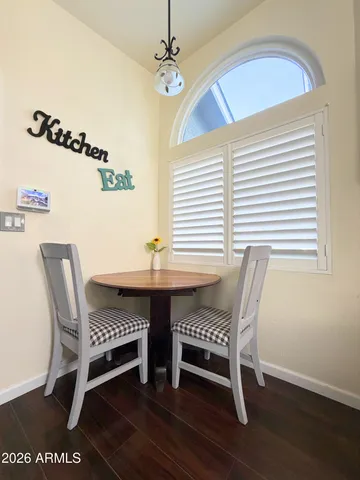 a view of a dining room with furniture