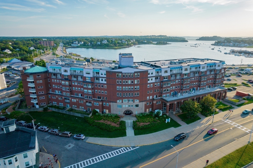 9 Park Avenue, Unit 705 Hull, MA 02045 - Photo 19 of 22 a view of a city with tall buildings and a big yard
