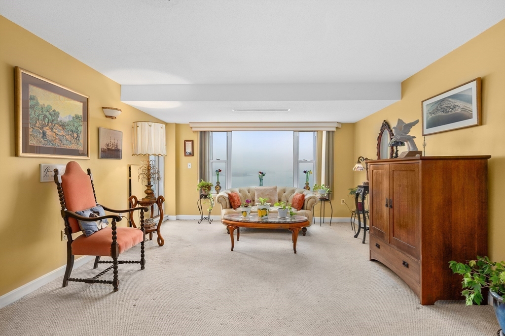 9 Park Avenue, Unit 705 Hull, MA 02045 - Photo 5 of 22 a outdoor space with furniture