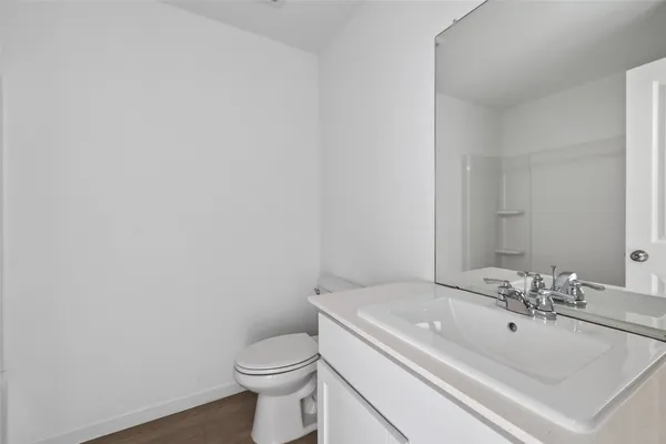 a bathroom with a sink and a toilet