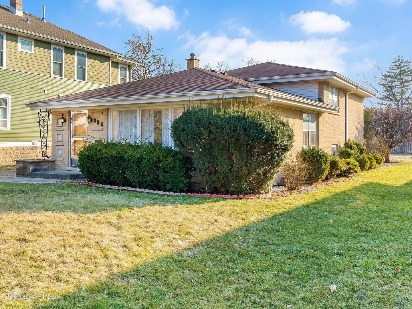 365 Olmsted Road Riverside, IL 60546 - Photo 1 of 23 a front view of a house with garden