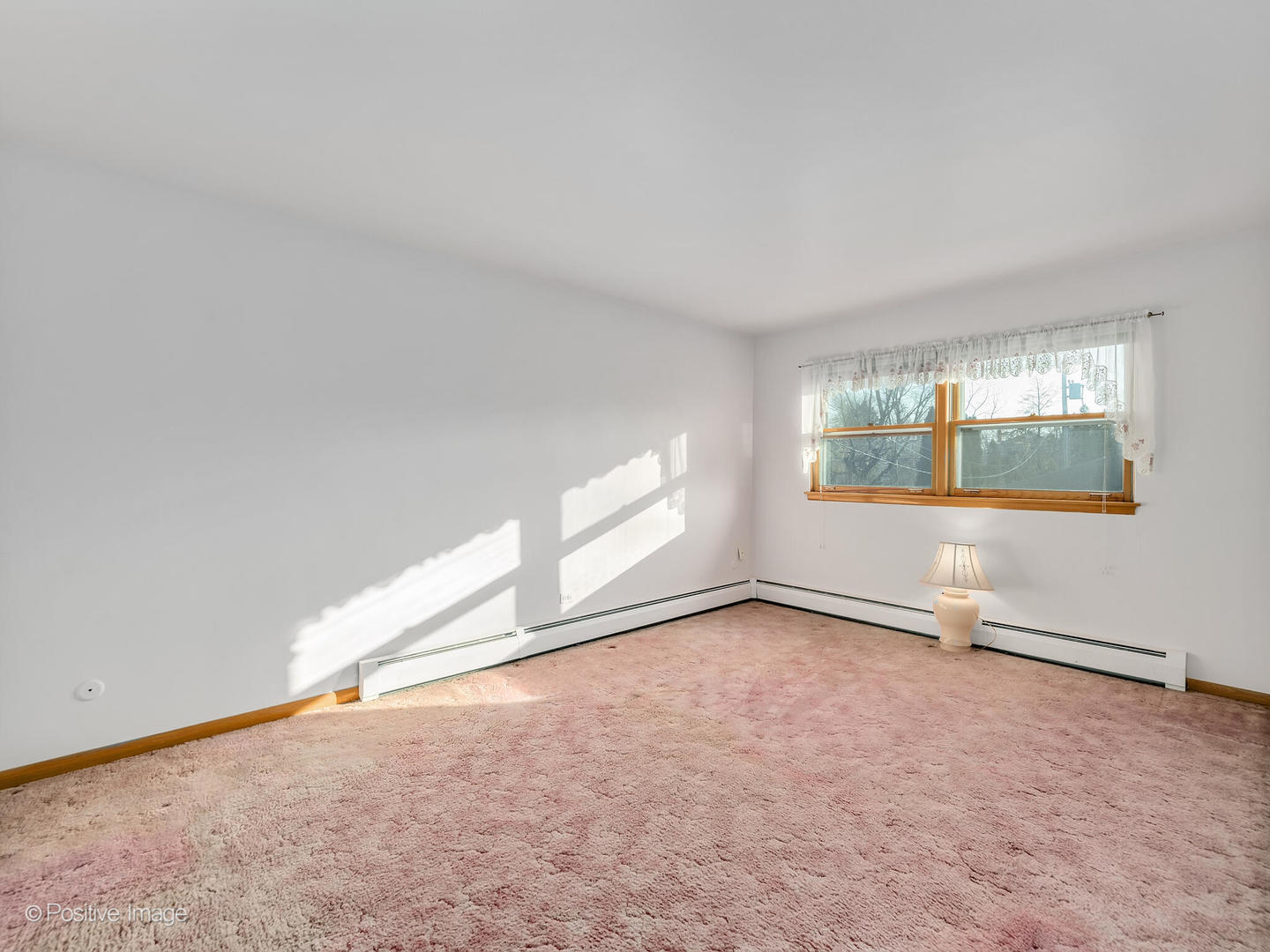 365 Olmsted Road Riverside, IL 60546 - Photo 11 of 23 an empty room with a window