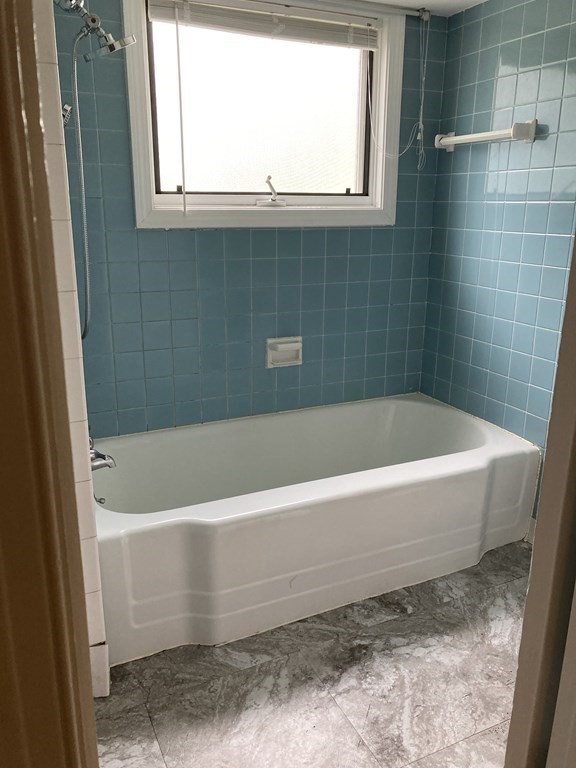 151 Ridge Road Rutland, MA 01543 - Photo 6 of 8 a bathroom with a bathtub