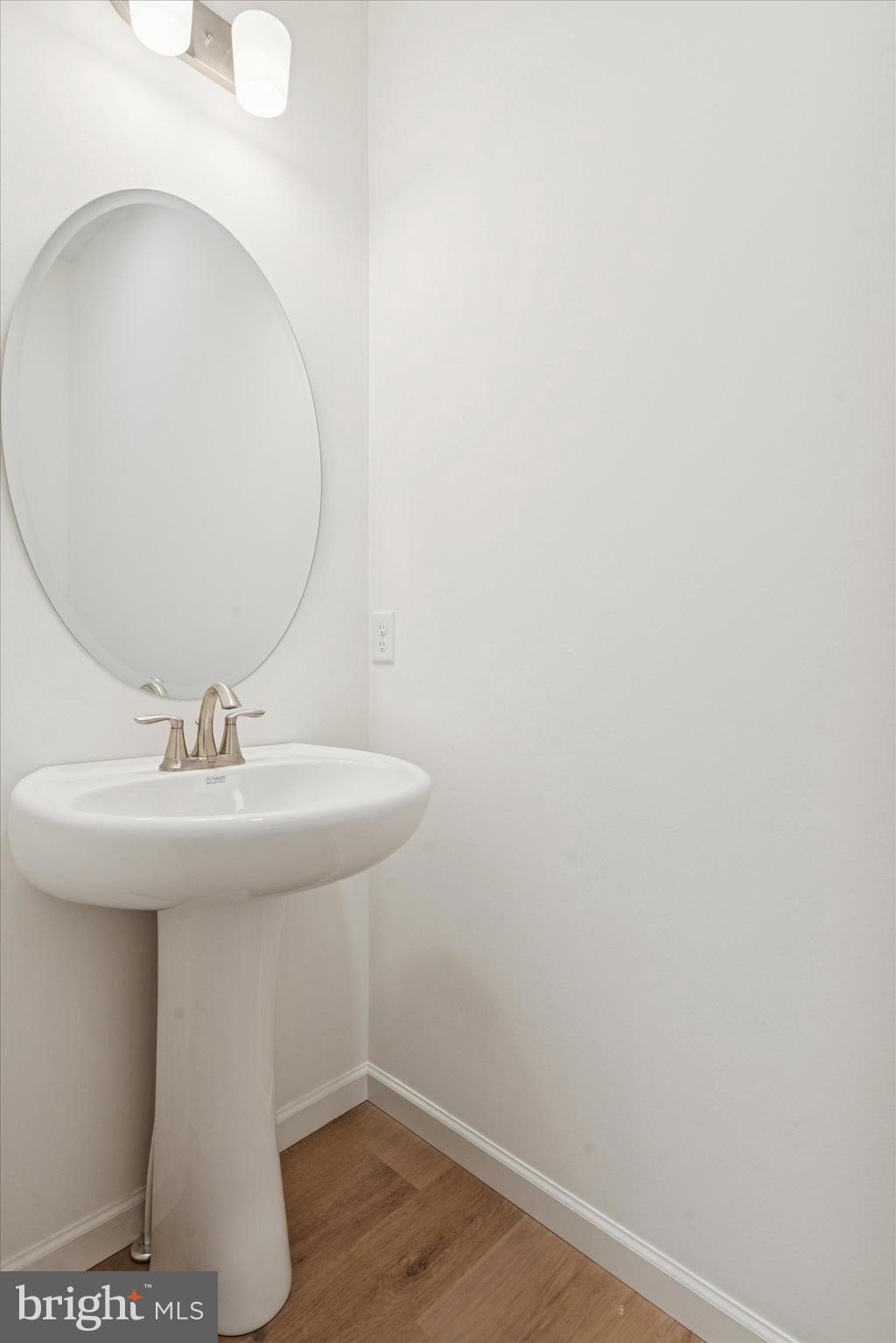 144 Silversmith Road Oxford, PA 19363 - Photo 17 of 20 a bathroom with a sink and mirror