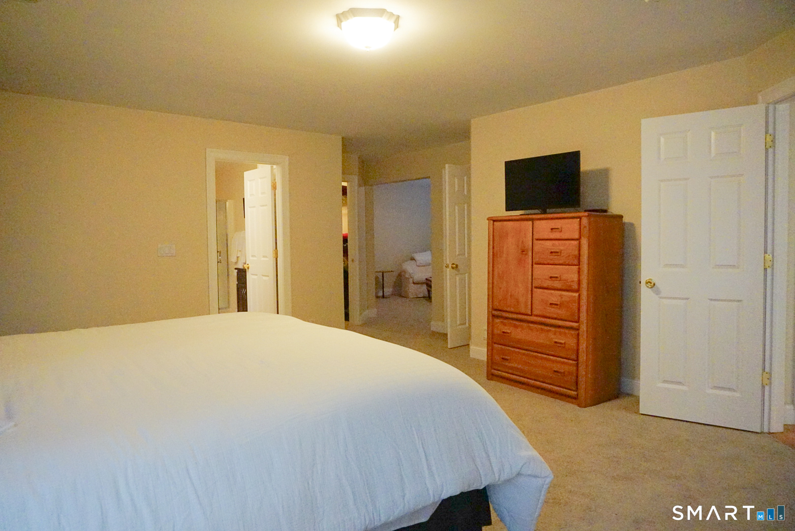 33 Knoll Ridge Court Middletown, CT 06457 - Photo 30 of 40 a bedroom with a bed and a television