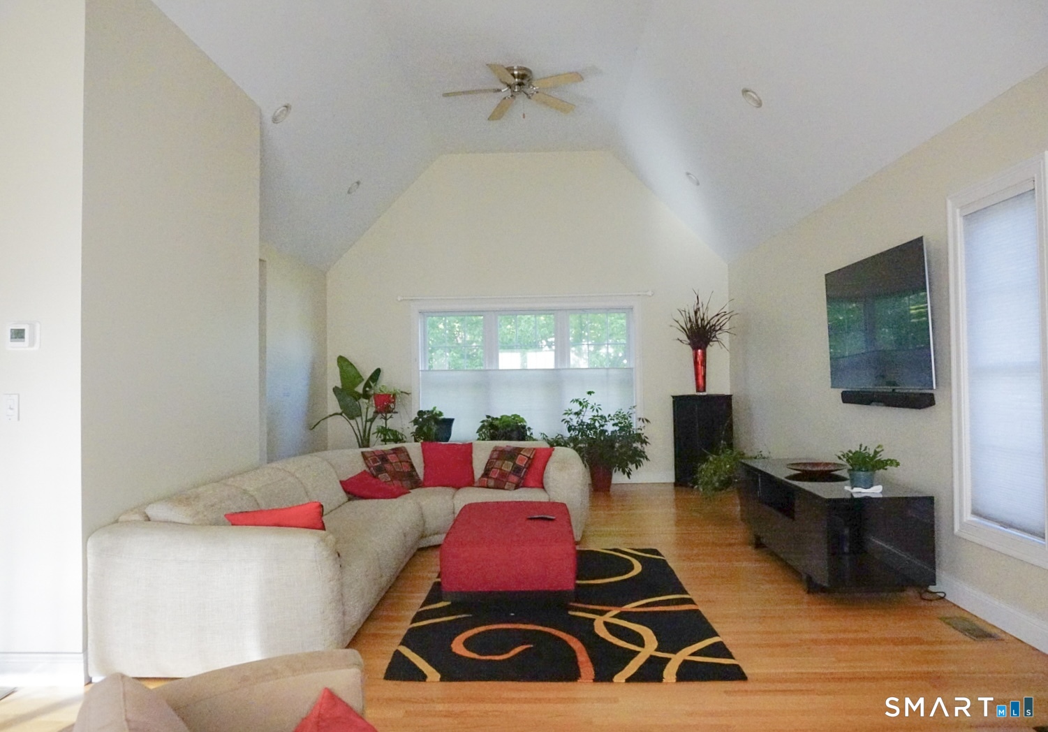 33 Knoll Ridge Court Middletown, CT 06457 - Photo 5 of 40 a bedroom with a bed and a flat screen tv