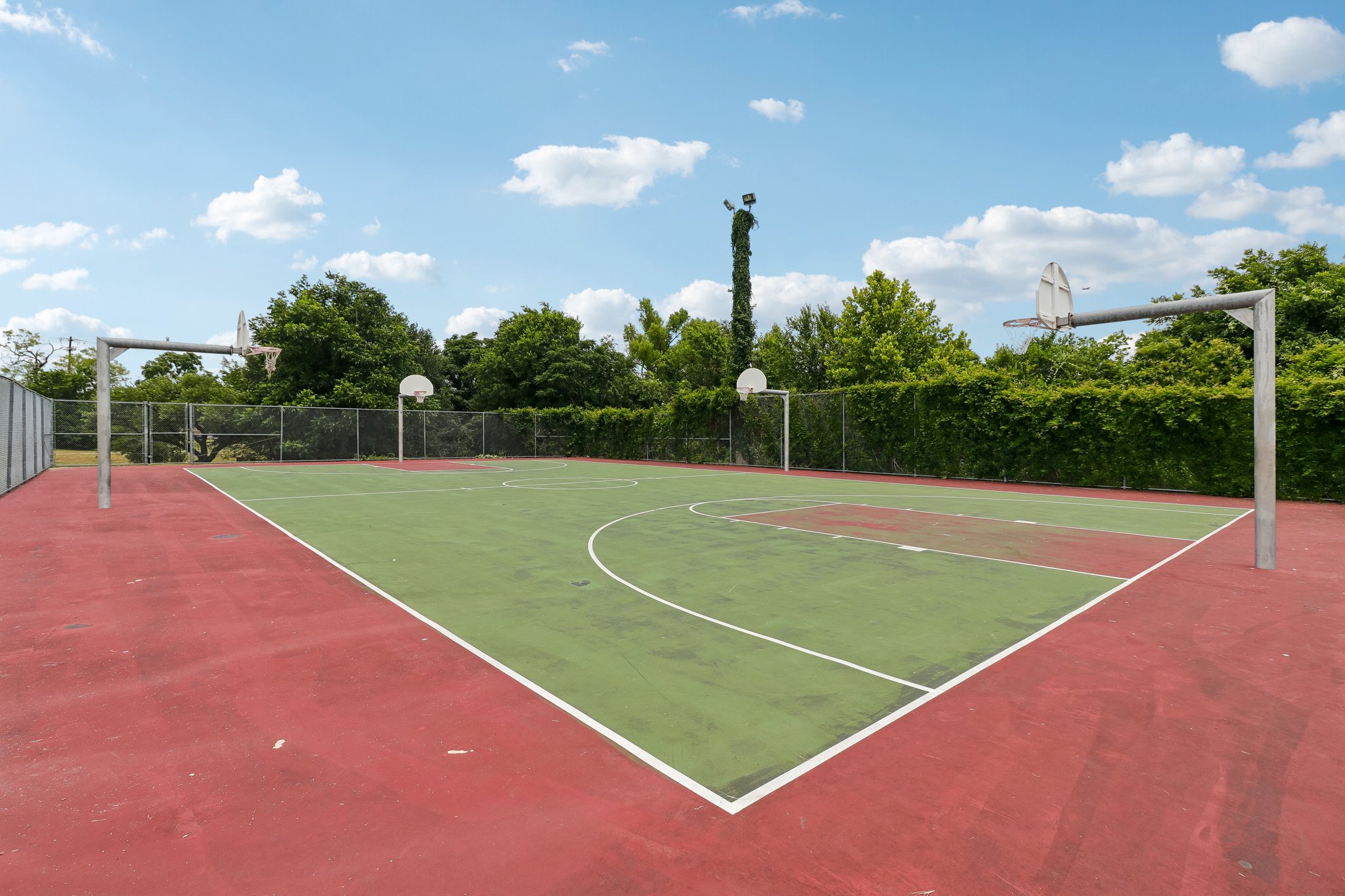 5809 Coventry Lane Austin, TX 78723 - Photo 34 of 35 An outdoor basketball court provides a dedicated space for recreation and active living just minutes away.