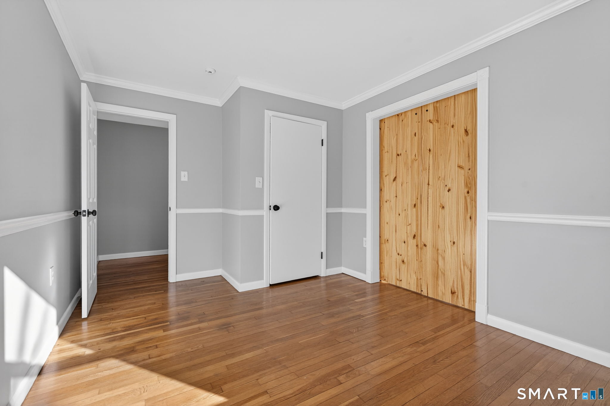 23 Holbrook Road Seymour, CT 06483 - Photo 16 of 53 an empty room with wooden floor and closet area