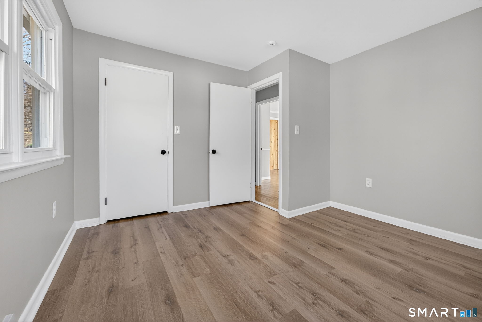 23 Holbrook Road Seymour, CT 06483 - Photo 21 of 53 a view of an empty room with wooden floor and a window