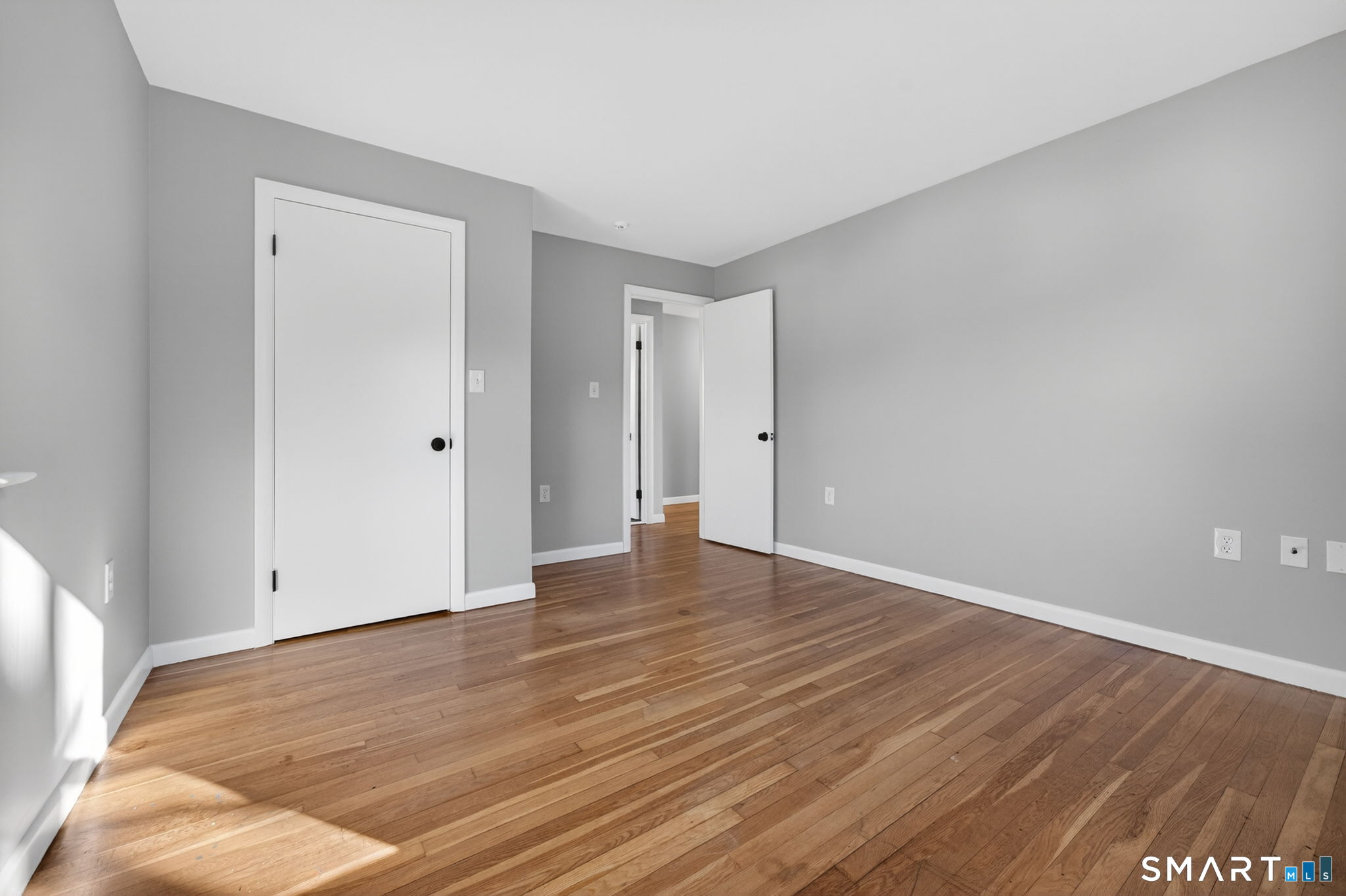 23 Holbrook Road Seymour, CT 06483 - Photo 23 of 53 a view of an empty room and wooden floor