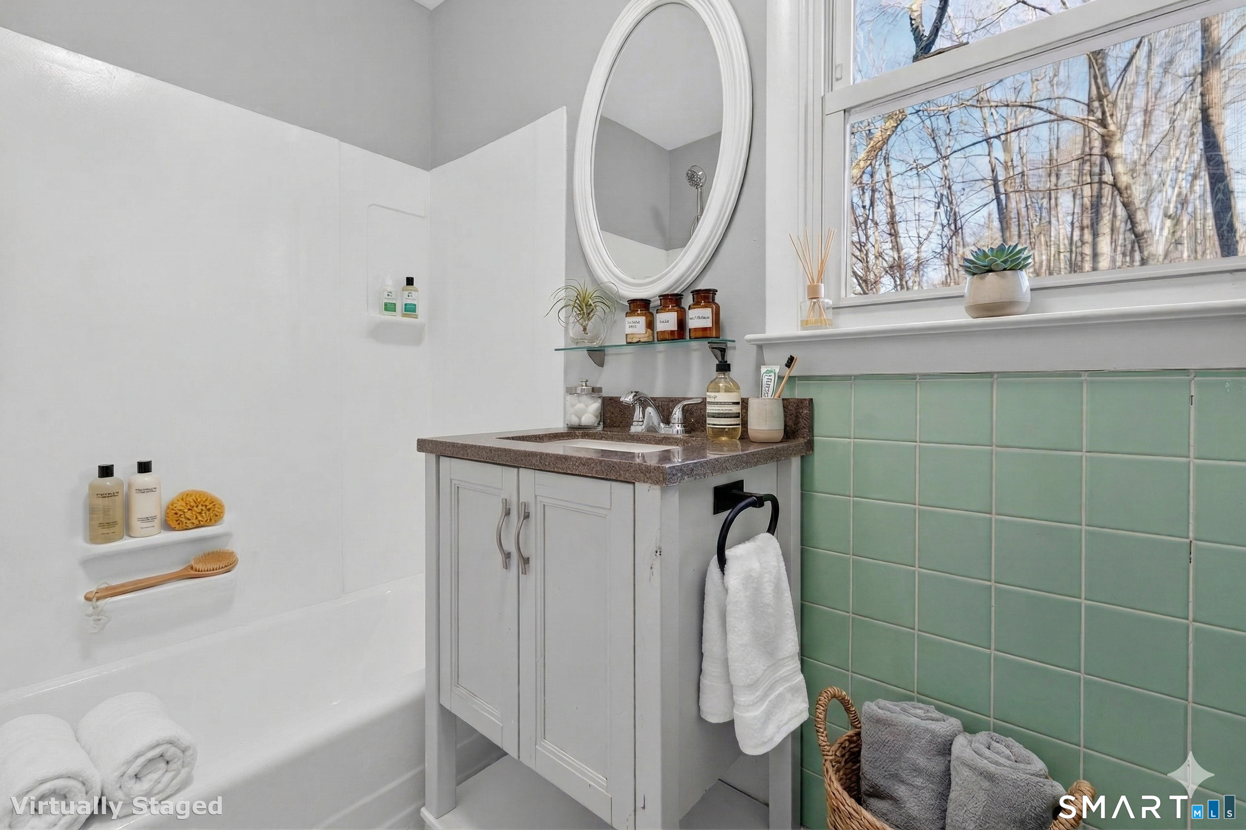 23 Holbrook Road Seymour, CT 06483 - Photo 25 of 53 a bathroom with a sink a toilet and a mirror