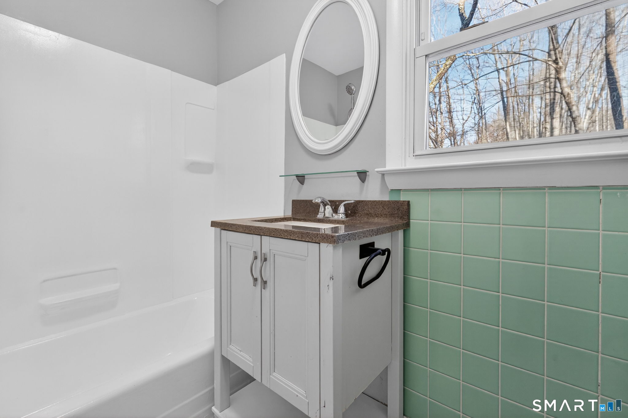 23 Holbrook Road Seymour, CT 06483 - Photo 26 of 53 a bathroom with a sink a mirror and a bathtub
