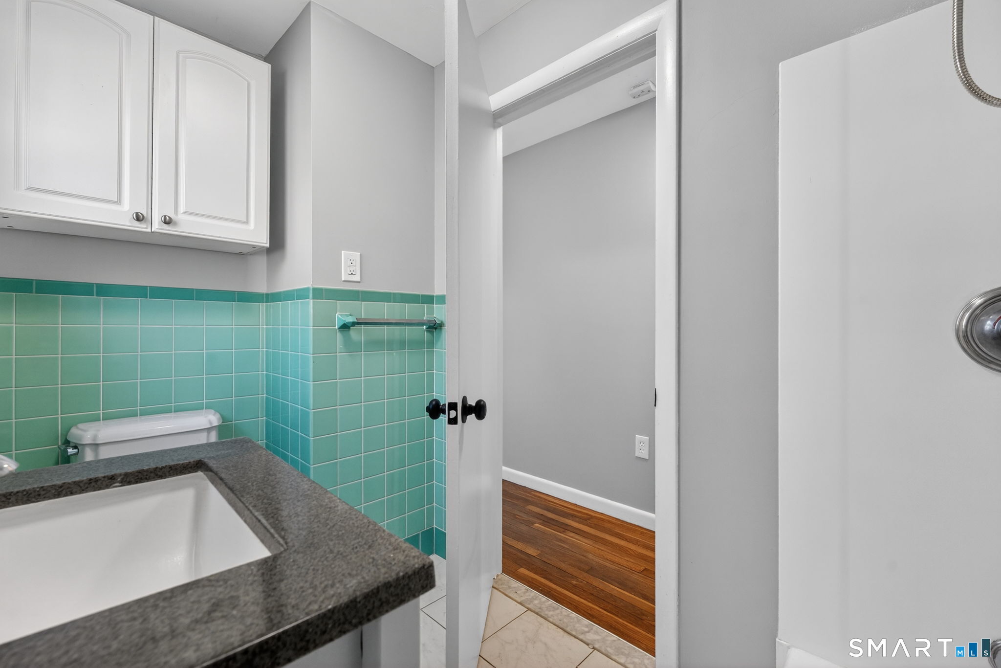 23 Holbrook Road Seymour, CT 06483 - Photo 28 of 53 a bathroom with a granite countertop sink and green walls