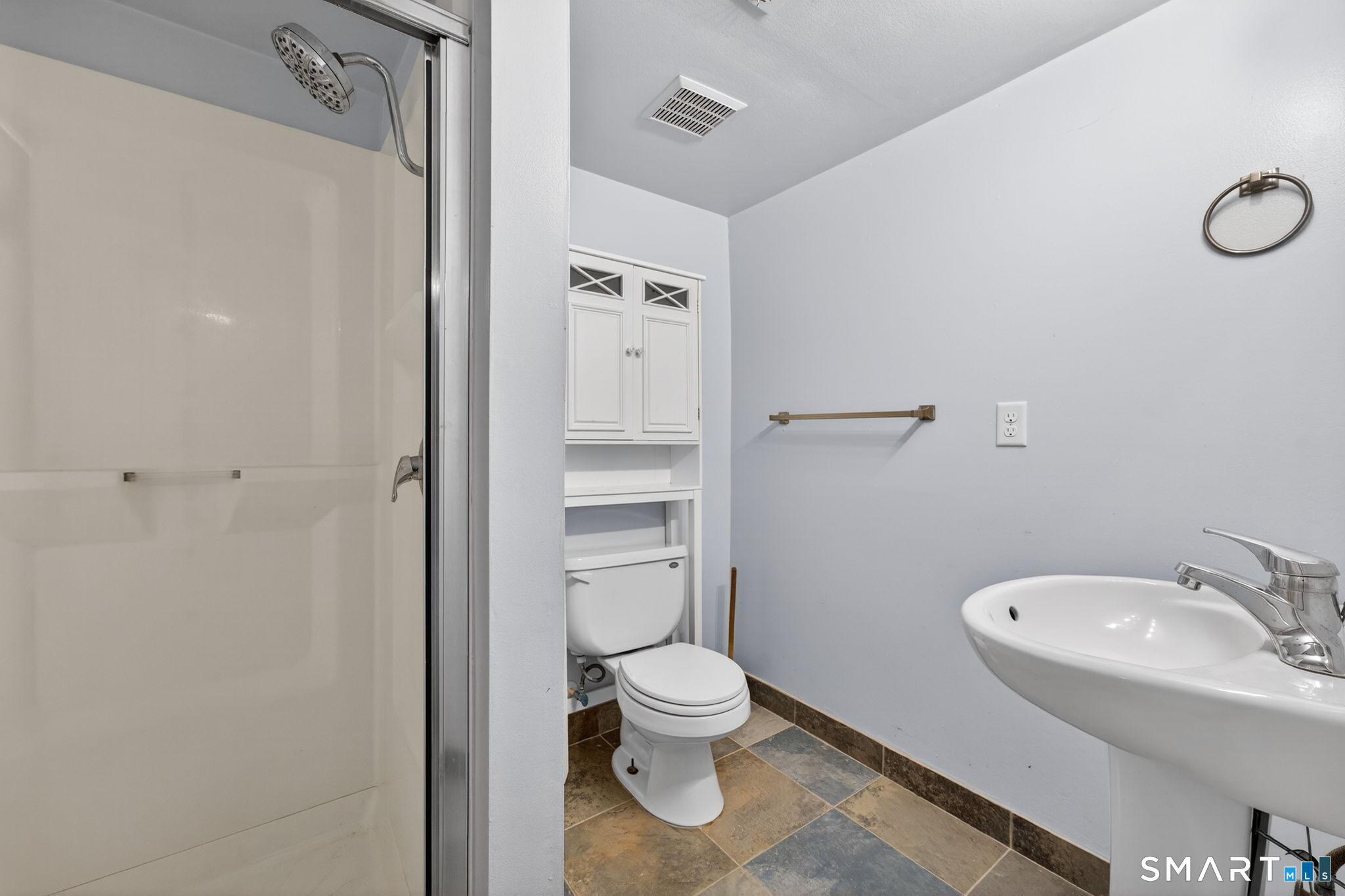 23 Holbrook Road Seymour, CT 06483 - Photo 31 of 53 a bathroom with a granite countertop toilet a sink and a mirror