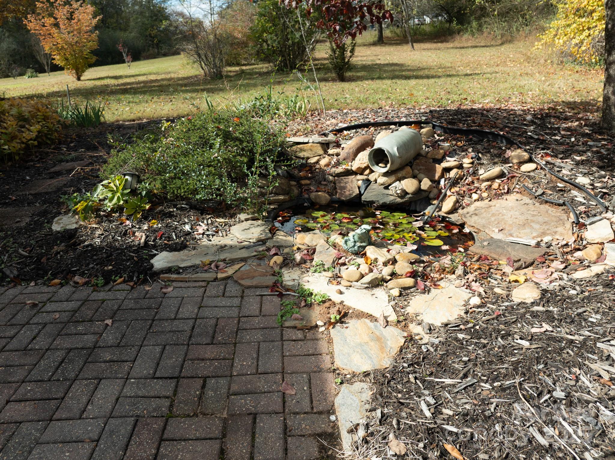 4541 Hartland Road Lenoir, NC 28645 - Photo 27 of 40 a view of a yard with an outdoor space