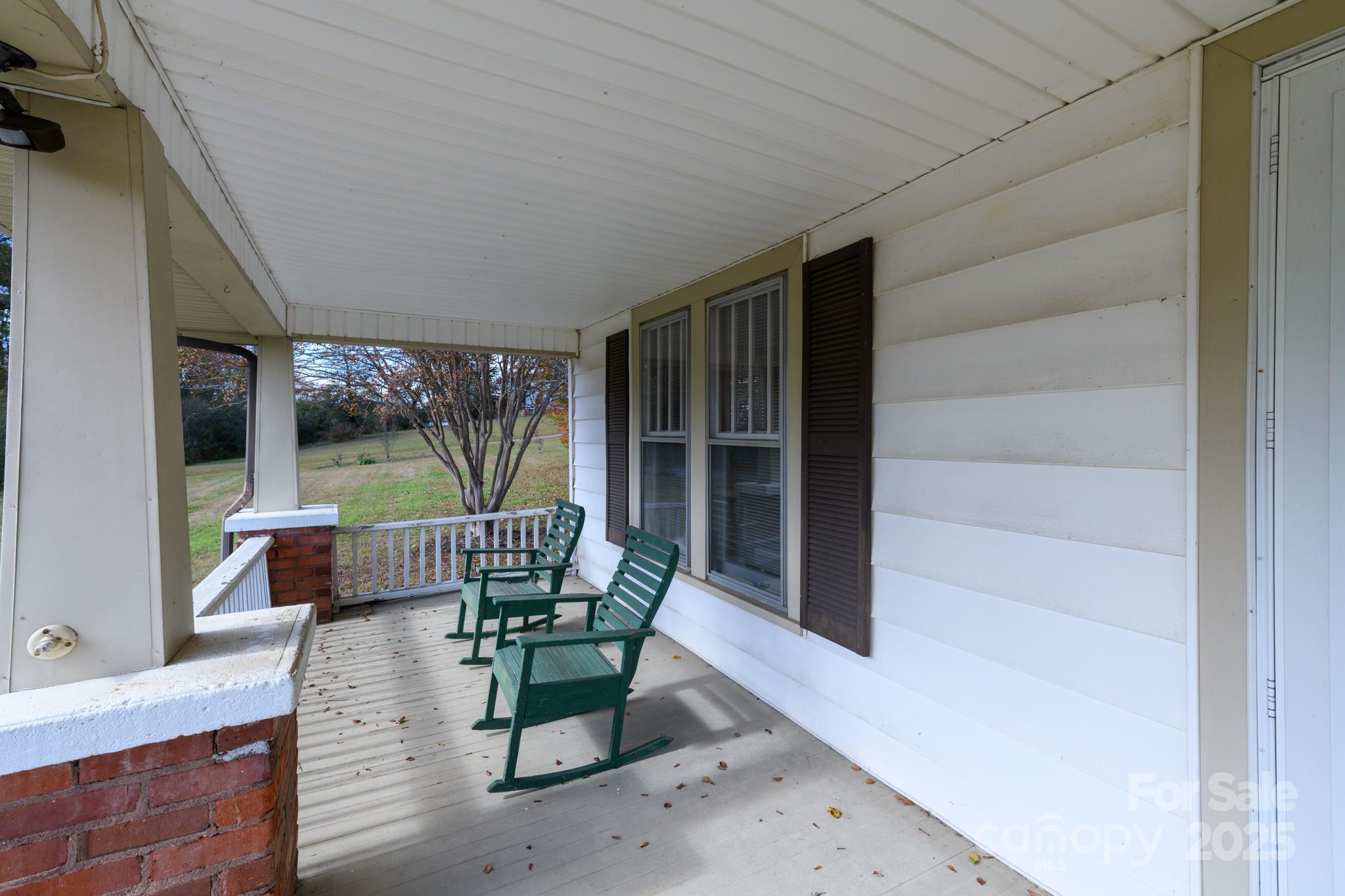 4541 Hartland Road Lenoir, NC 28645 - Photo 31 of 40 a outdoor living space with patio furniture and a potted plant