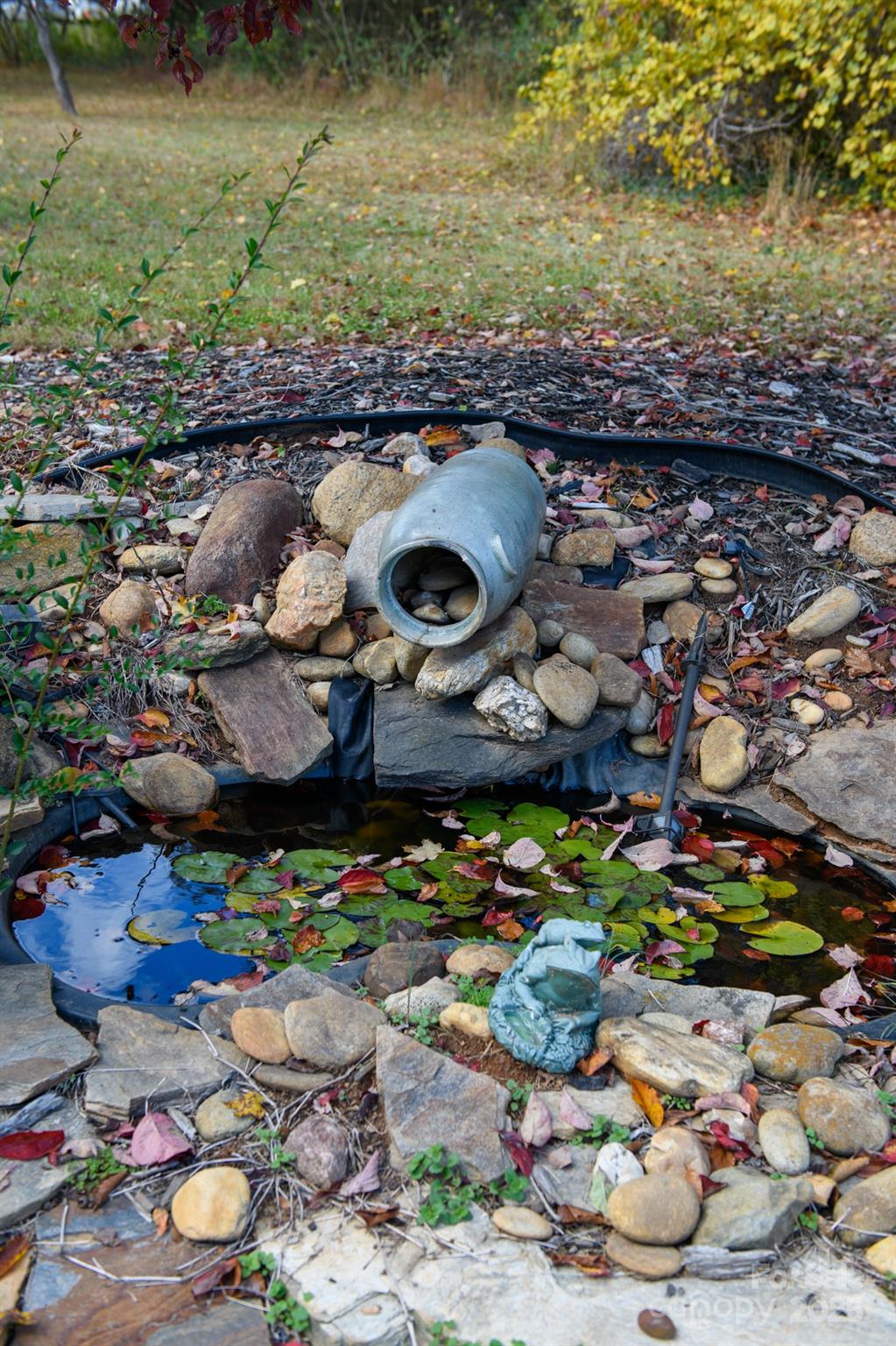 4541 Hartland Road Lenoir, NC 28645 - Photo 37 of 40 a picture of water view with outdoor seating