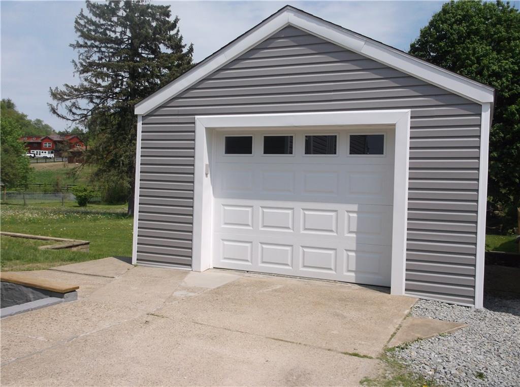 420 Rostraver Road Belle Vernon, PA 15012 - Photo 2 of 25 The detached garage has been rebuilt and a new door was added! It also is attached to a separate workshop area with a door that opens to the back yard!