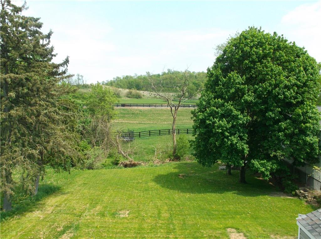 420 Rostraver Road Belle Vernon, PA 15012 - Photo 20 of 25 The 1/4 acre yard is big enough for all of your outdoor toys or gardening dreams!
