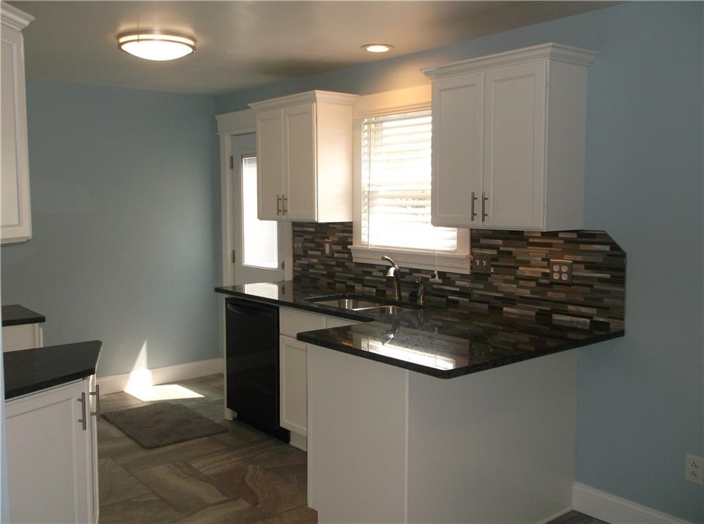 420 Rostraver Road Belle Vernon, PA 15012 - Photo 4 of 25 There's tons of natural lighting and even lights under the cupboards!