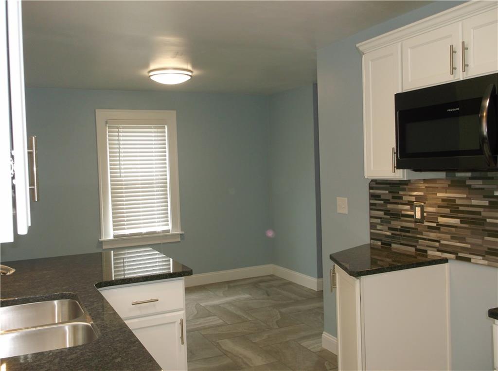 420 Rostraver Road Belle Vernon, PA 15012 - Photo 5 of 25 The dining area is big enough for all of your guests to enjoy!