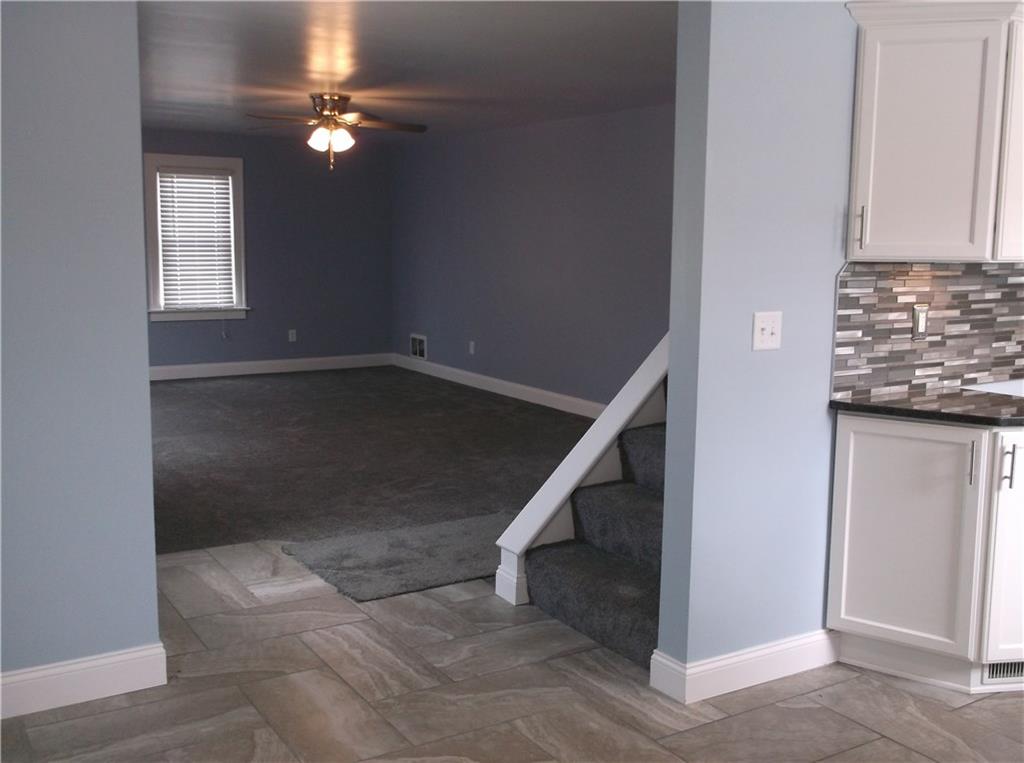 420 Rostraver Road Belle Vernon, PA 15012 - Photo 7 of 25 The dining area opens right into the spacious living room!
