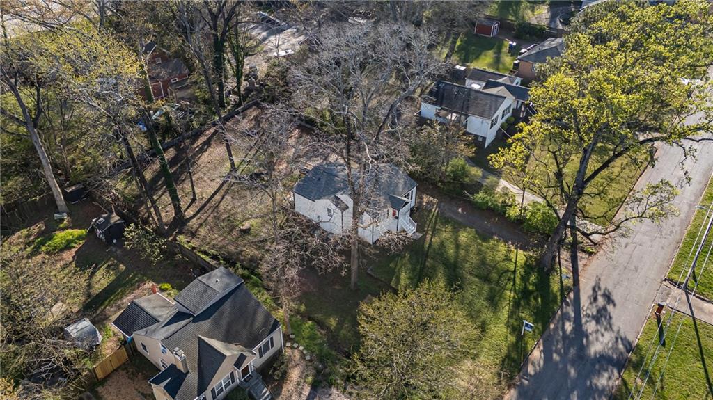2583 Joyce Avenue Decatur, GA 30032 - Photo 26 of 30 a backyard of a house with lots of green space