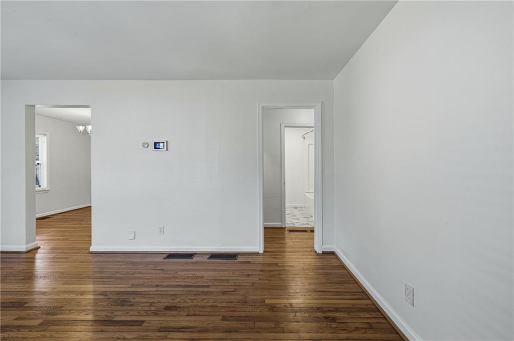 2583 Joyce Avenue Decatur, GA 30032 - Photo 9 of 30 a view of a hallway with wooden floor
