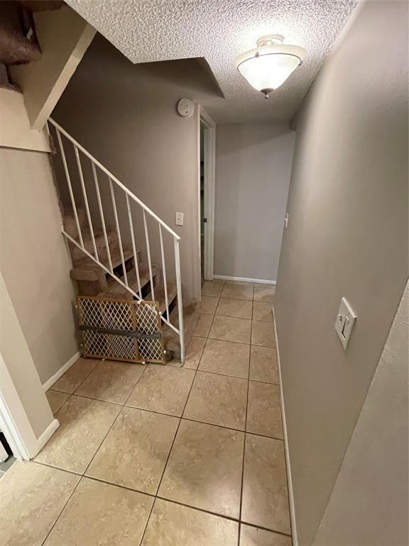 2156 Southwest 82nd Avenue, Unit 2156 Davie, FL 33324 - Photo 12 of 24 a view of entryway with stairs and a window