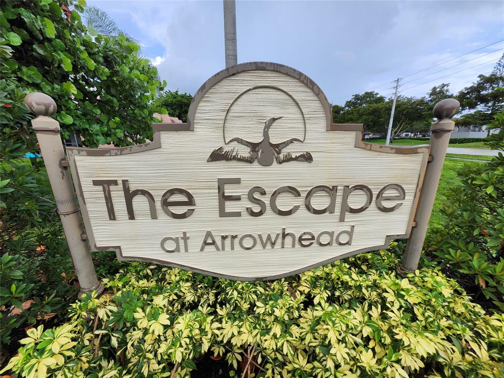 2156 Southwest 82nd Avenue, Unit 2156 Davie, FL 33324 - Photo 24 of 24 a sign that is on the side of a building