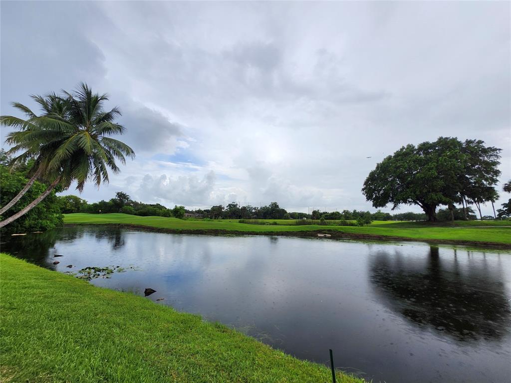 2156 Southwest 82nd Avenue, Unit 2156 Davie, FL 33324 - Photo 4 of 24 an aerial view of a house with outdoor space and lake view