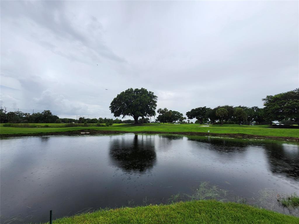 2156 Southwest 82nd Avenue, Unit 2156 Davie, FL 33324 - Photo 6 of 24 an aerial view of a garden with lake view