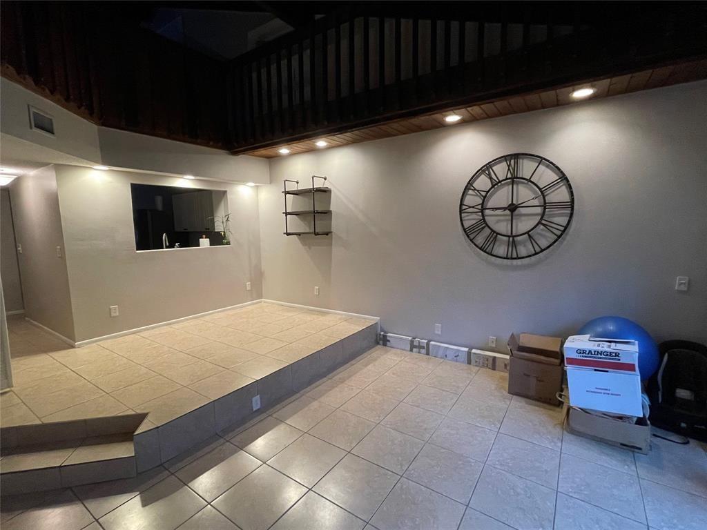 2156 Southwest 82nd Avenue, Unit 2156 Davie, FL 33324 - Photo 10 of 24 a room with pool table and a flat screen tv