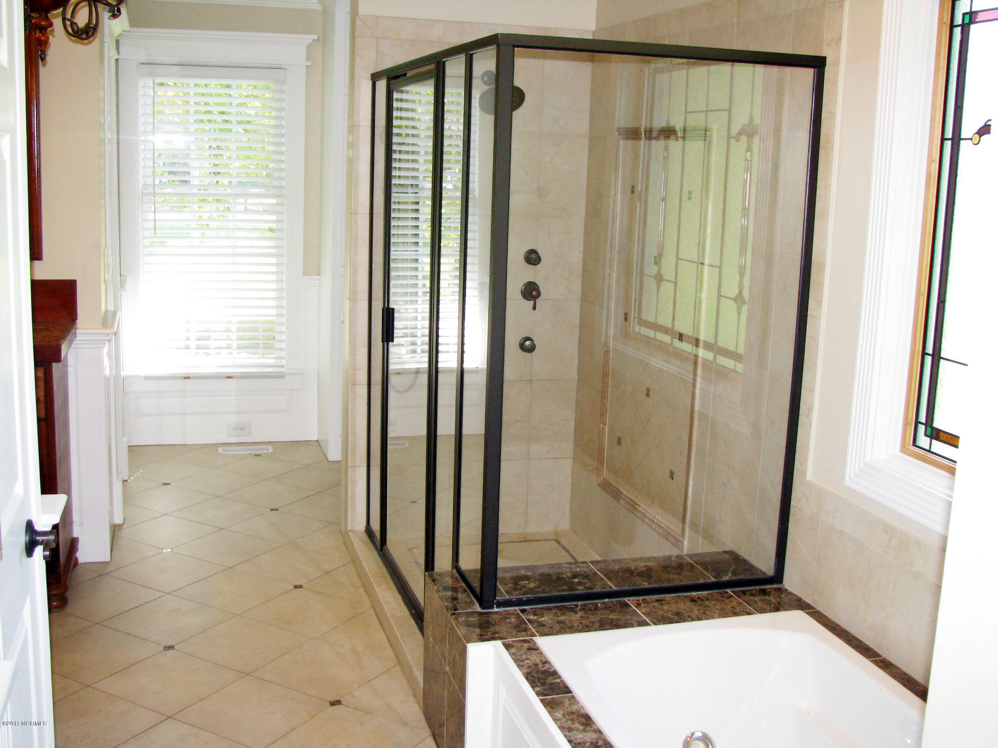 3947 Eds Grocery Road Williamston, NC 27892 - Photo 11 of 30 Shower with seat. Master has heated floors.