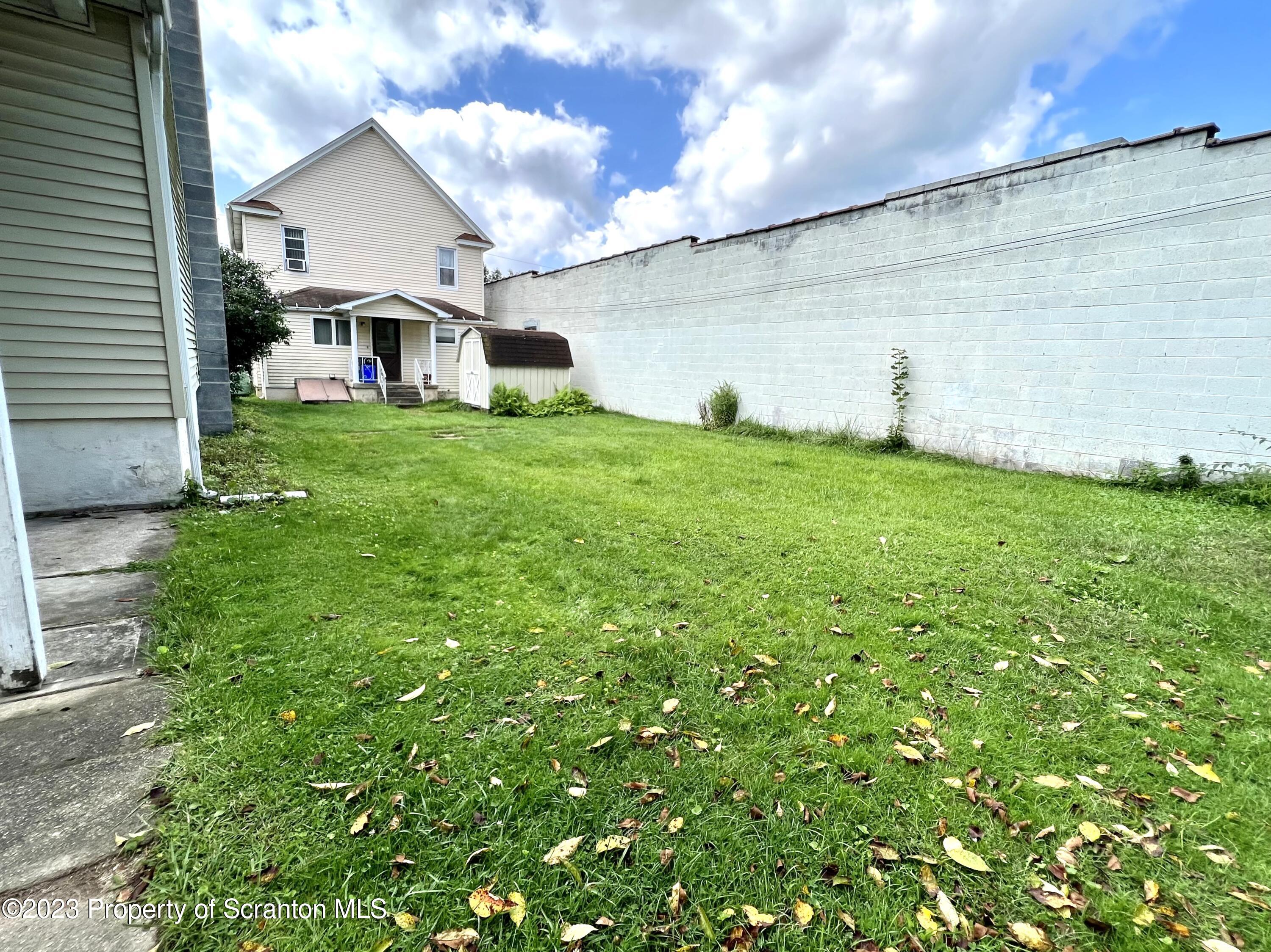 218 Jackson Street Olyphant, PA 18447 - Photo 18 of 46 a view of a back yard of the house