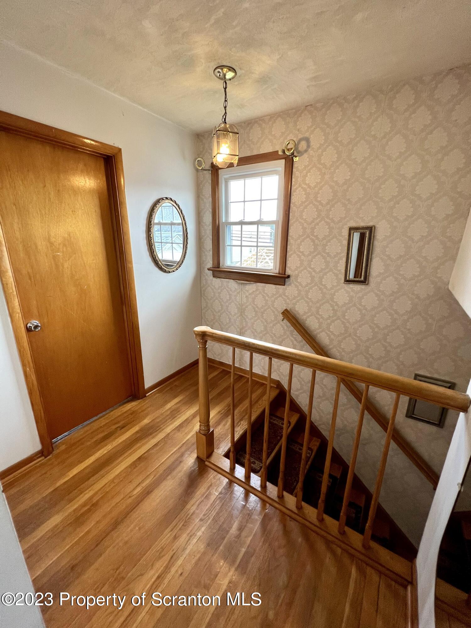 218 Jackson Street Olyphant, PA 18447 - Photo 21 of 46 a view of entryway with wooden floor