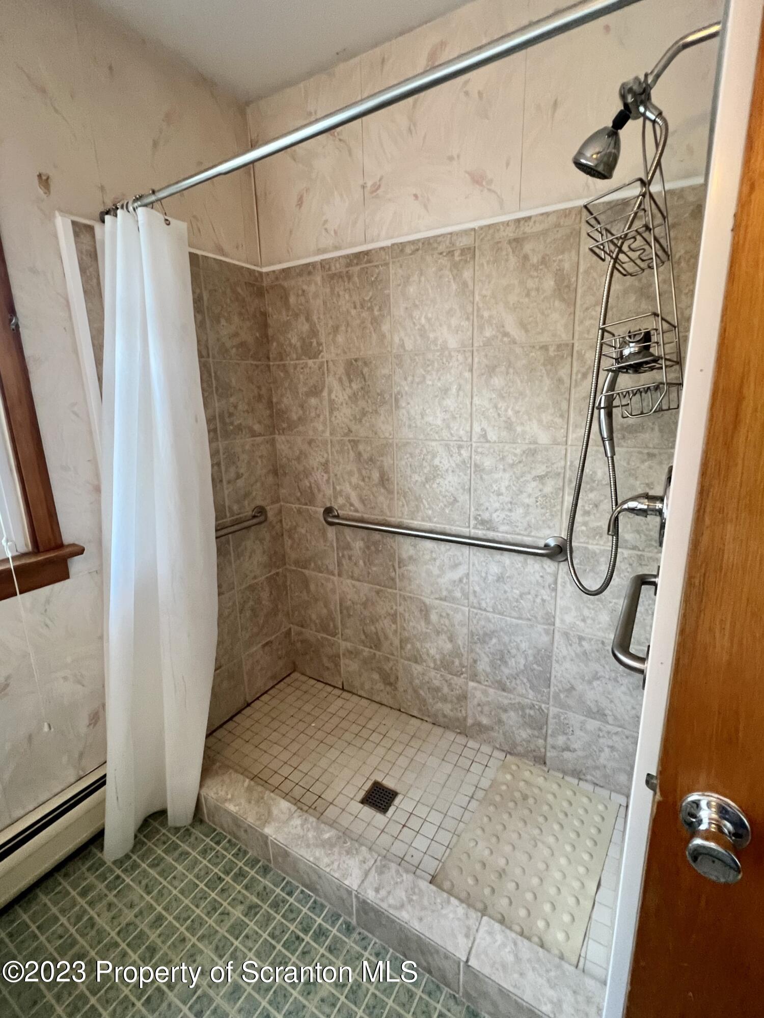 218 Jackson Street Olyphant, PA 18447 - Photo 23 of 46 a bathroom with a shower