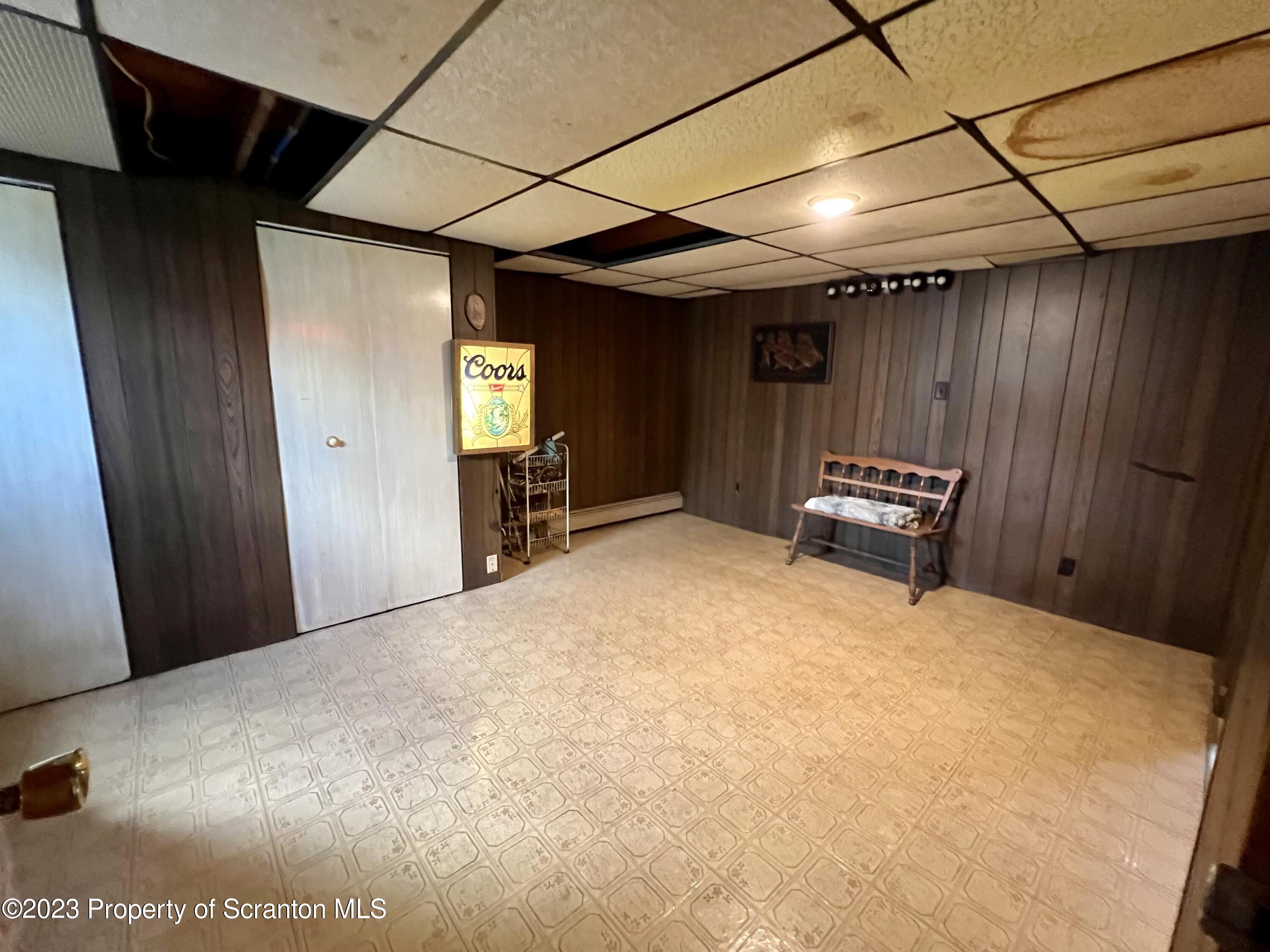 218 Jackson Street Olyphant, PA 18447 - Photo 31 of 46 a view of empty room with wooden floor