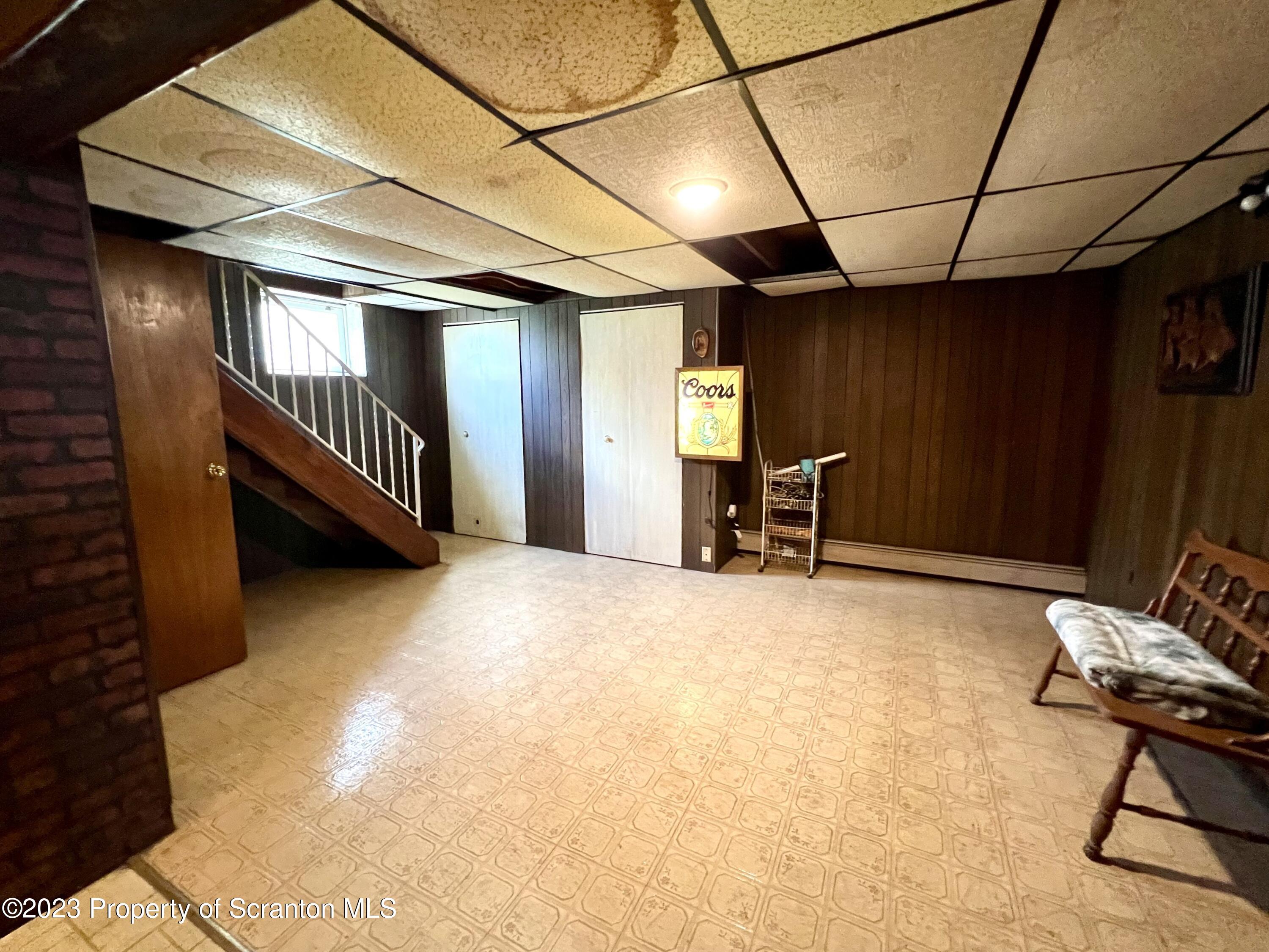 218 Jackson Street Olyphant, PA 18447 - Photo 32 of 46 a view of a livingroom with furniture and a window
