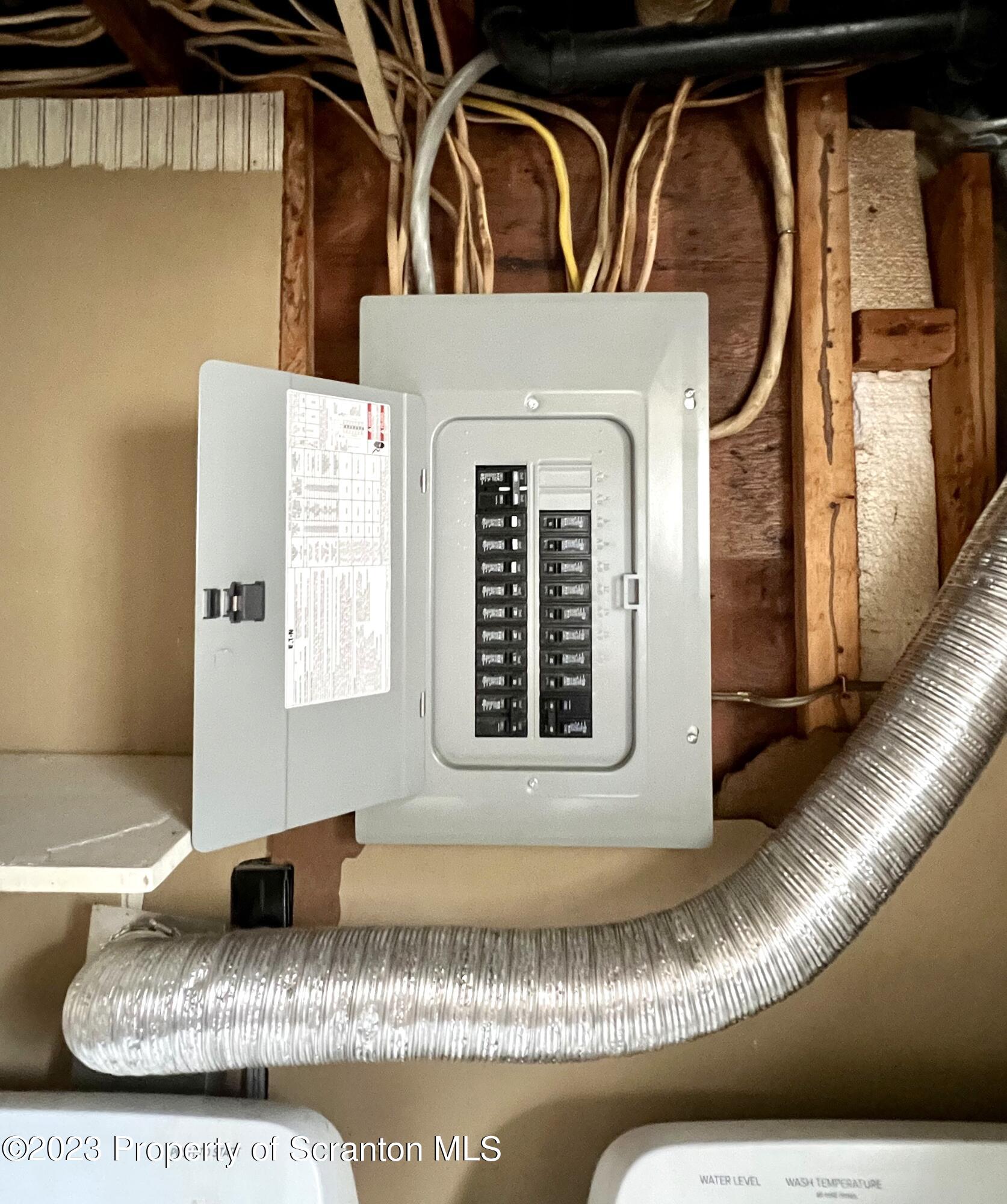 218 Jackson Street Olyphant, PA 18447 - Photo 38 of 46 a black and white photo of a living room