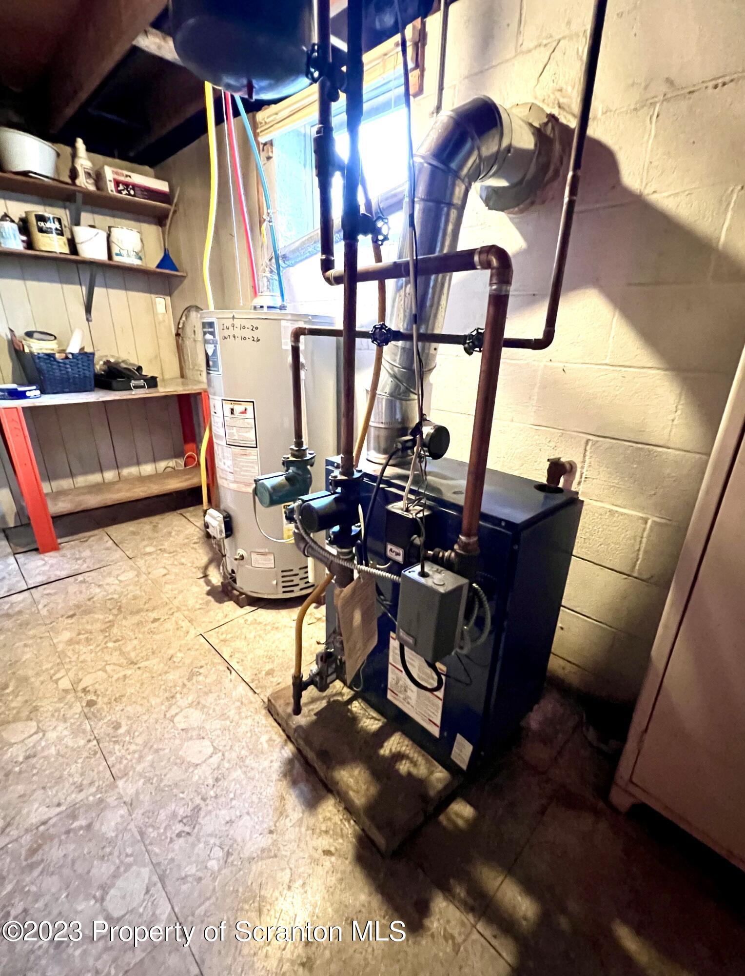 218 Jackson Street Olyphant, PA 18447 - Photo 39 of 46 a living room with furniture a rug and a large window