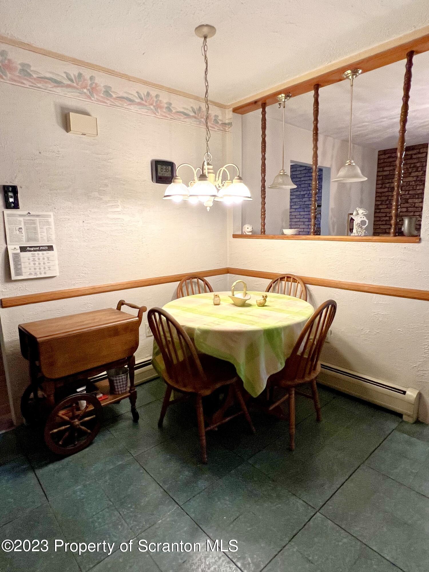 218 Jackson Street Olyphant, PA 18447 - Photo 10 of 46 a dining room with furniture and window