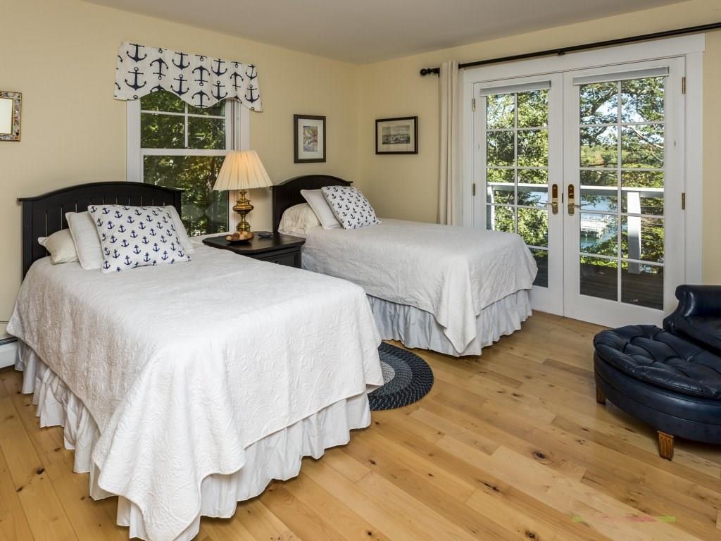 680 Ocean Point Road East Boothbay, ME 04544 - Photo 17 of 31 First floor bedroom with walk-in...