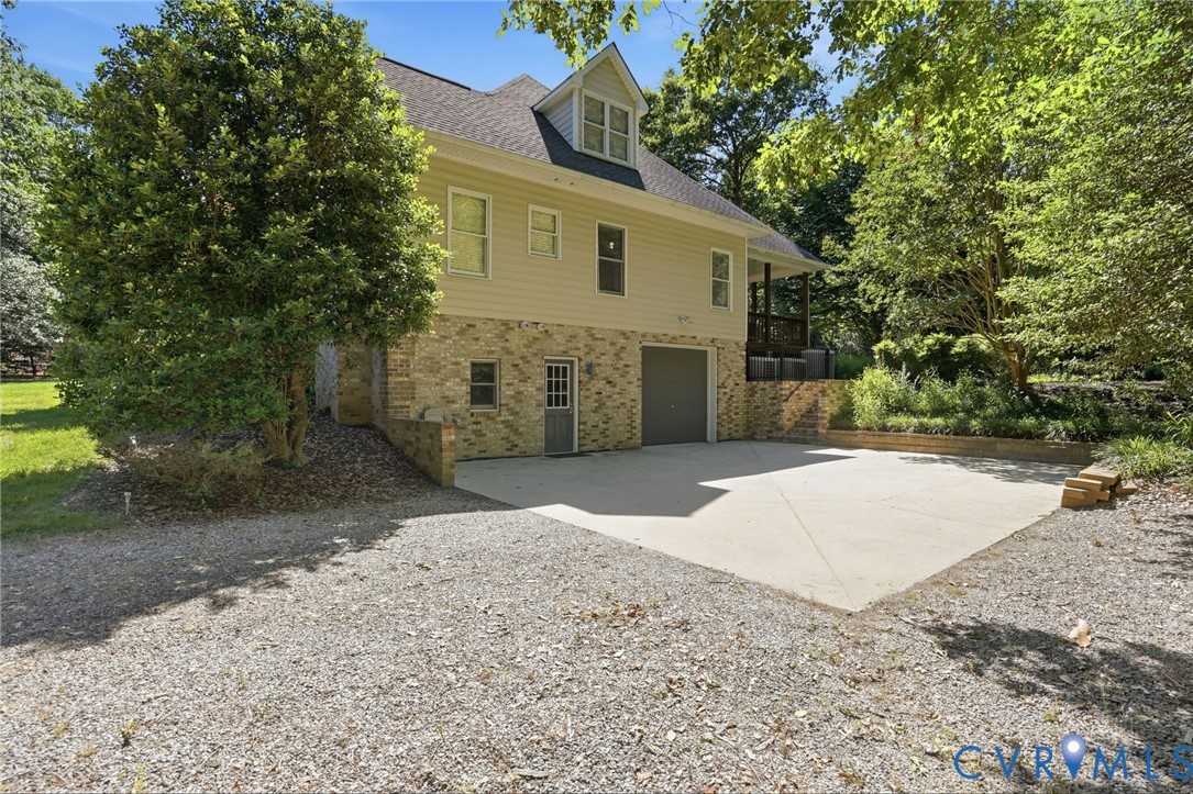 12123 Deer Ridge Court Ashland, VA 23005 - Photo 62 of 63 a view of a house with a yard