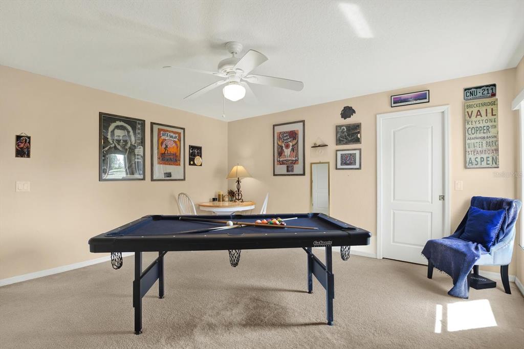 5220 Kirkwood Avenue Spring Hill, FL 34608 - Photo 23 of 39 a view of a workspace with furniture