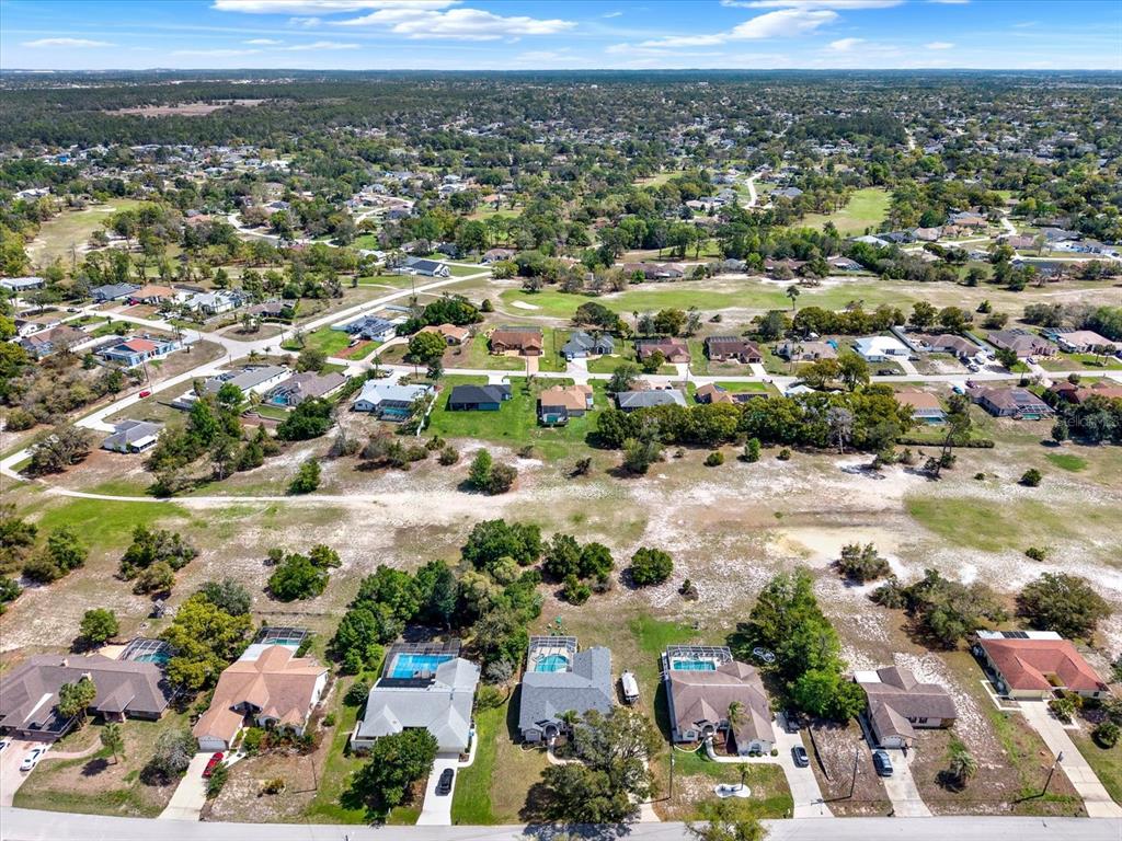 5220 Kirkwood Avenue Spring Hill, FL 34608 - Photo 37 of 39 an aerial view of a city